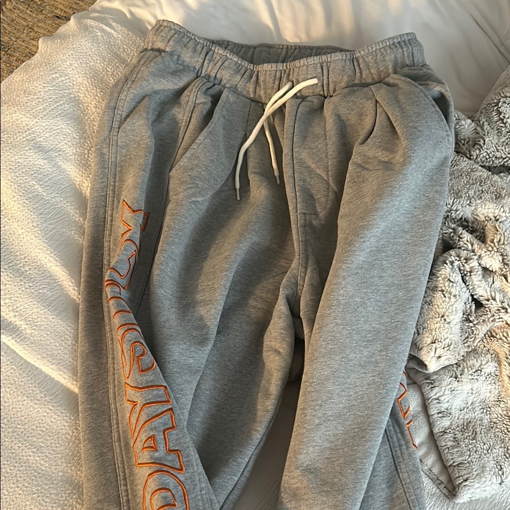 Grey and Orange MondaySuck sweatpants